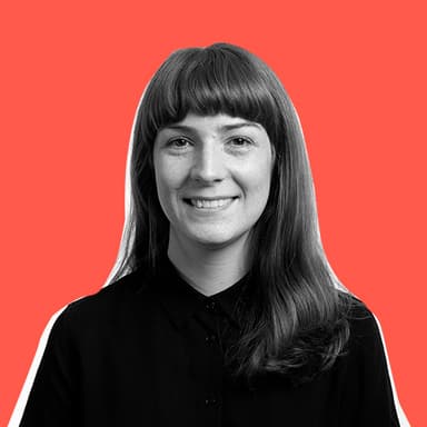Portrait of Jen Tweedie. Jen is smiling confidently at the camera.