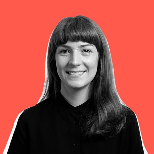 Portrait of Jen Tweedie. Jen is smiling confidently at the camera.